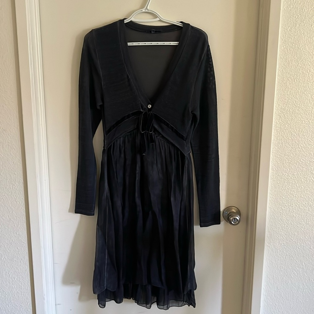 Beautiful dress that has velvet accents.